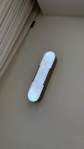 Customer photo review of Priv Marbrex Black–Gold Alabaster Wall Sconce