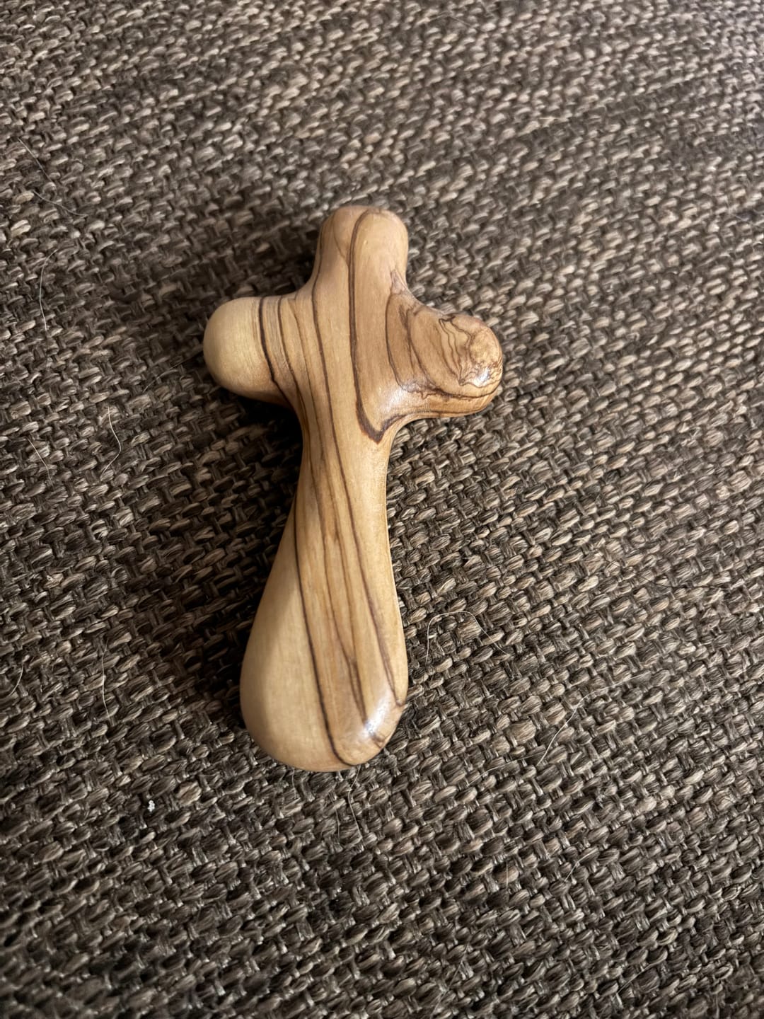 Customer photo review of Olive Wood Comfort Cross (Handheld)