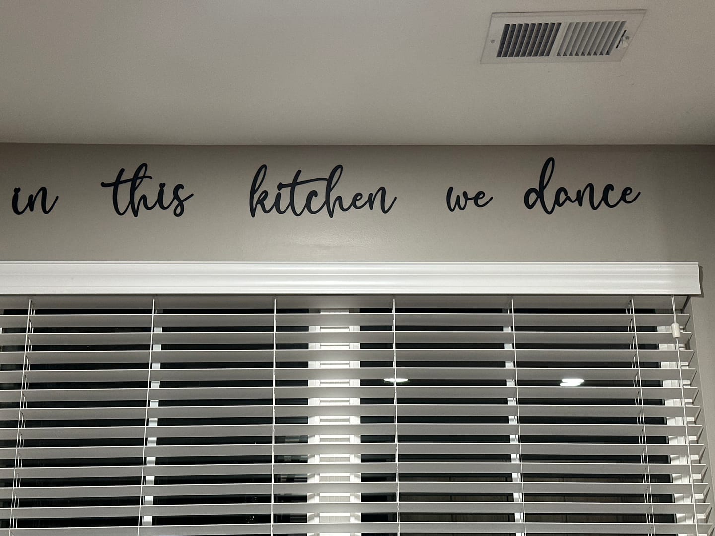Customer photo review of In This Kitchen We Dance Metal Sign