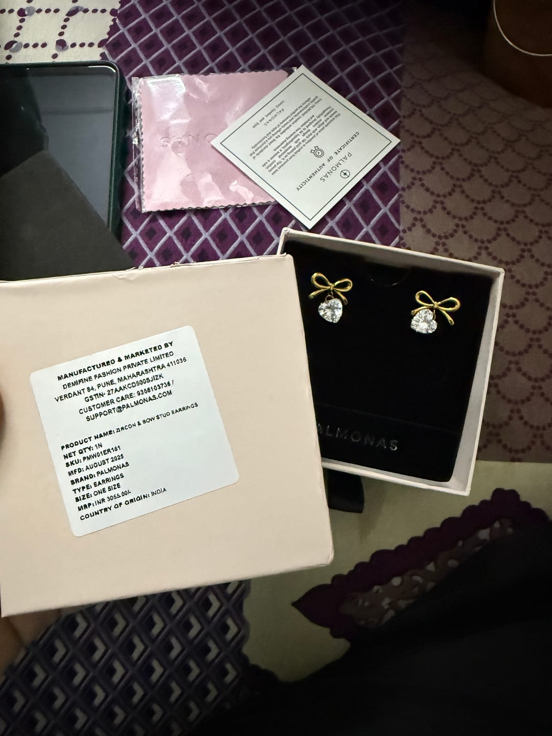 Customer photo review of Bi-metal Wrapped With Love Earrings
