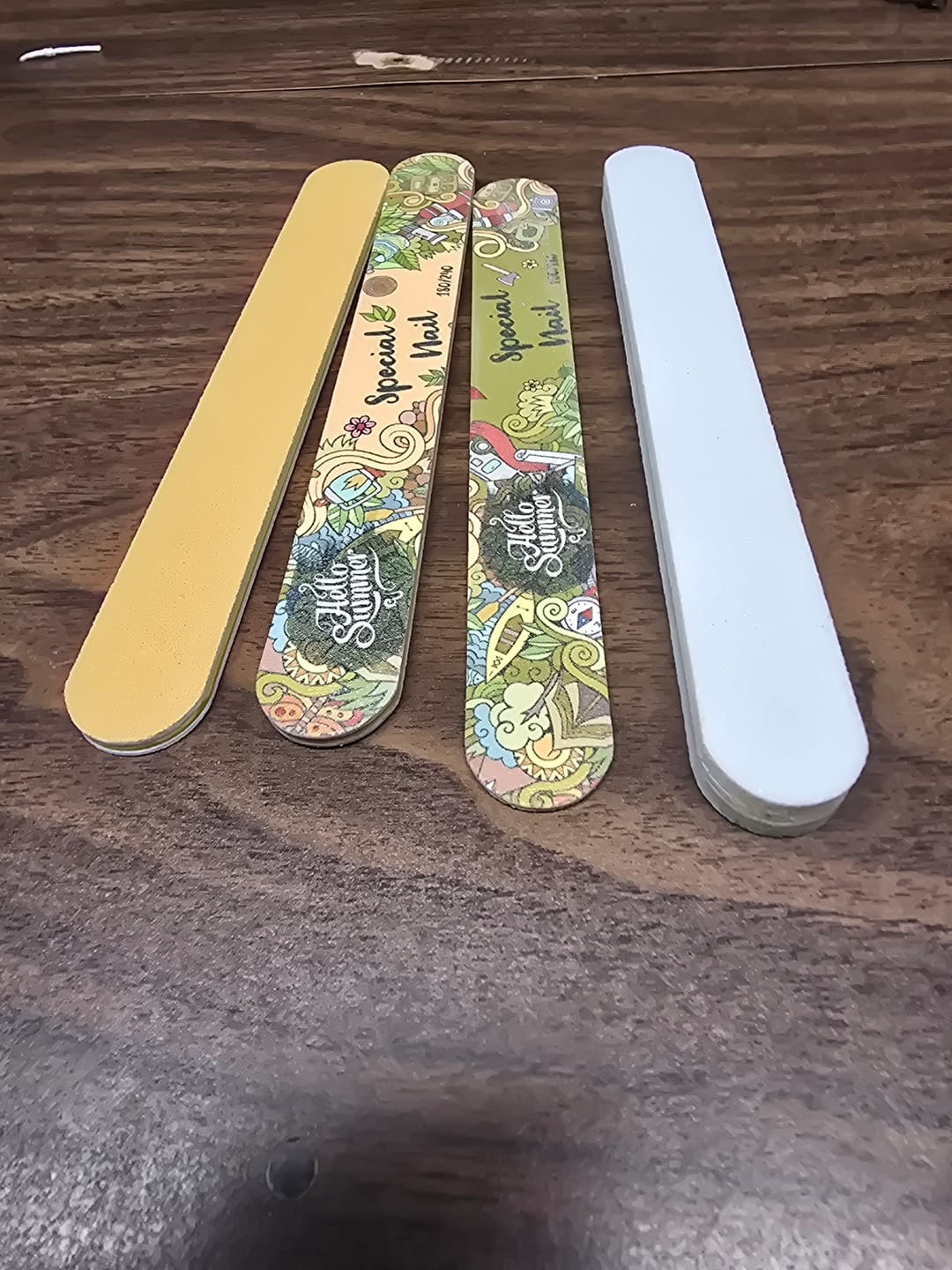 Customer photo review of 4 PCS Nail File Set - Includes Sponge File, Emery File, and Wooden File for Manicures