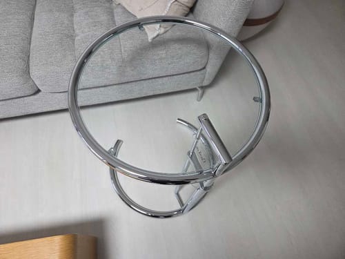 Customer photo showing chrome frame and clear glass top