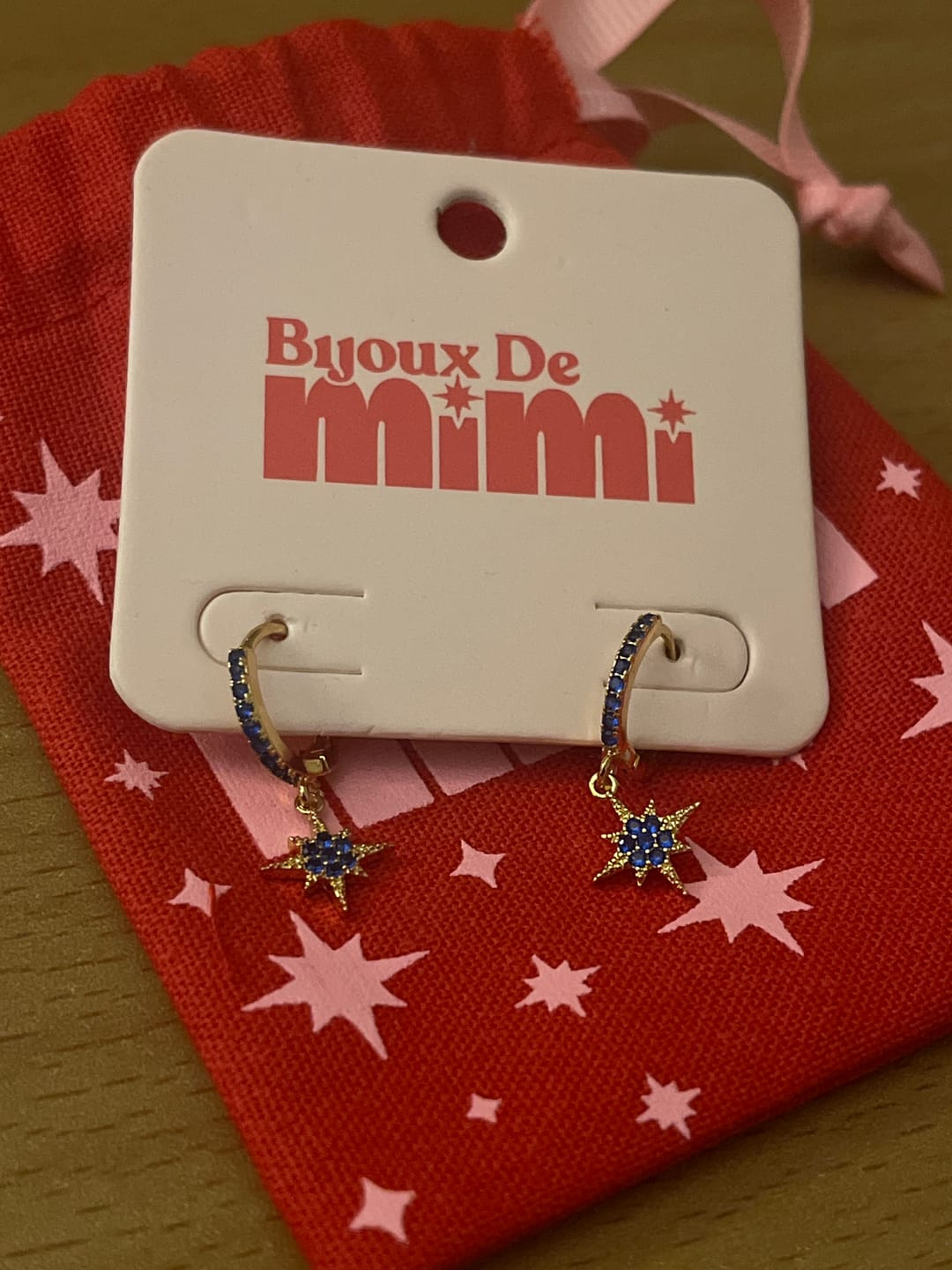Customer photo review of Cosima Blue Gold Star Huggie Earrings