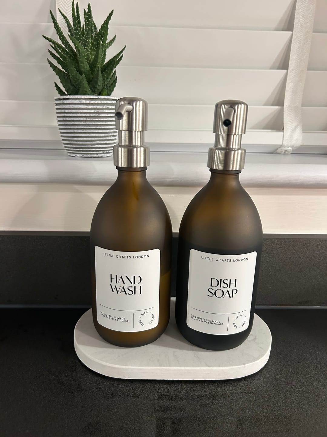 Customer photo review of Set of 2 Frosted Amber Glass Bottle 500 ML with Metal Pump & Small Tray White Label