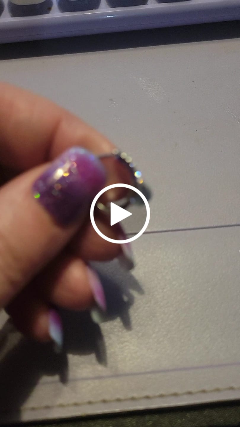 Customer video review of Amaya 18k White Gold Plated 16mm Twisted Hoop Earrings with Swarovski Crystals