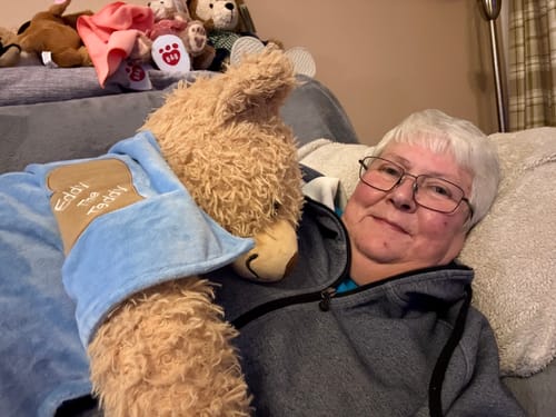 Customer photo review of Eddy The Teddy Snuggle Blanket