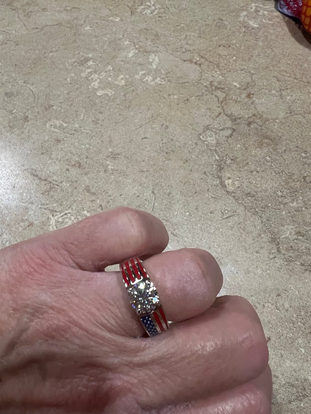 Customer photo review of Round Moissanite Engagement Ring with American Flag Enamel Band