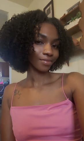 Customer photo review of Wavymy Afro Curly 7x5 HD Lace Closure Wig Pre-bleached Wear & Go Glueless Wigs Dome Cap 180% Density