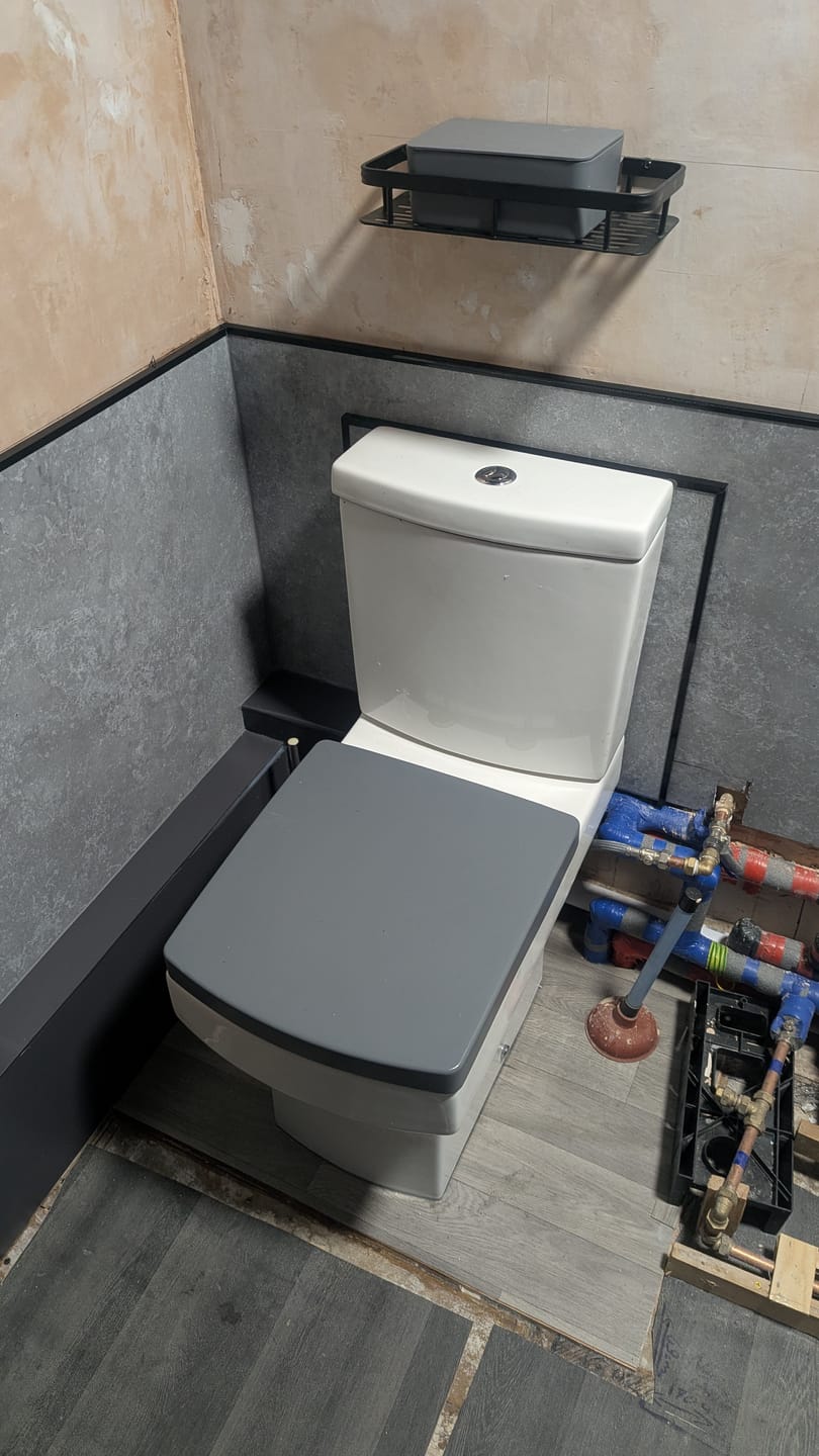 Customer photo review of Premium Grey Concrete Matt Shower Wall Panel – 1M x 2.4M