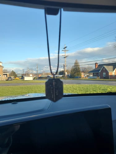 Customer photo review of St. Michael Medallion Necklace - Helps Pair Veterans With A Service Dog Or Shelter Dog