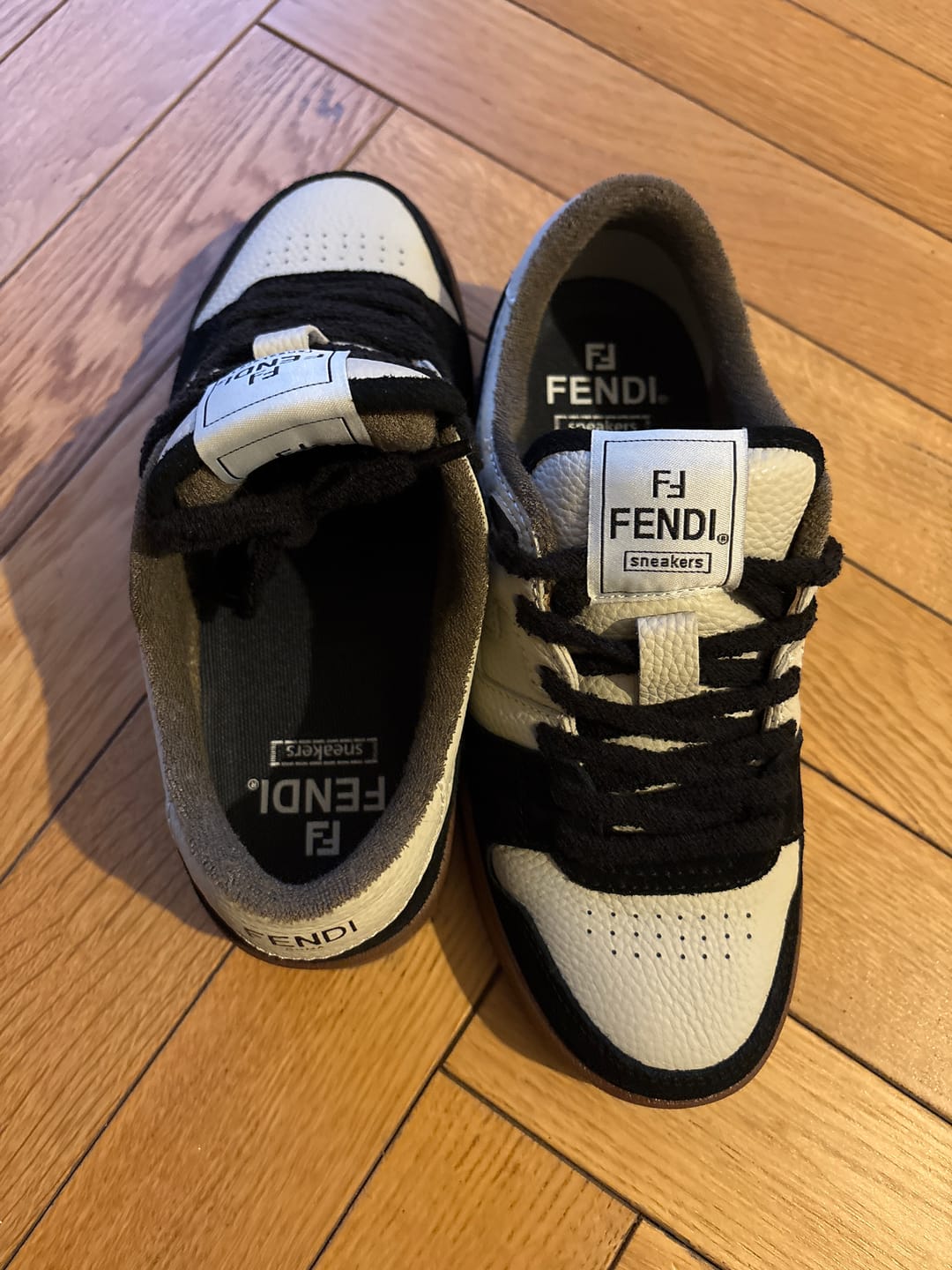 Customer photo review of FENDI CASUAL SNEAKER IN WHITE CALFSKIN AND BLACK SUEDE