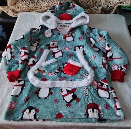 Customer photo review of Kids OLAOLA Blue Penguin Printed Wearable Blanket Hoodie Animals Onesie Oversized Soft Homewear With Giant Pocket