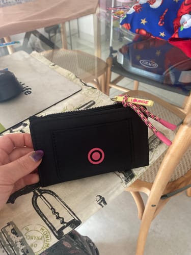 Reseña con foto de un cliente sobre Tarjetero Street