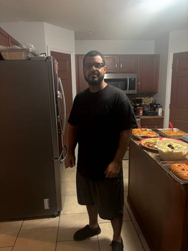 Customer photo review of Blackout Distressed Flag Tee