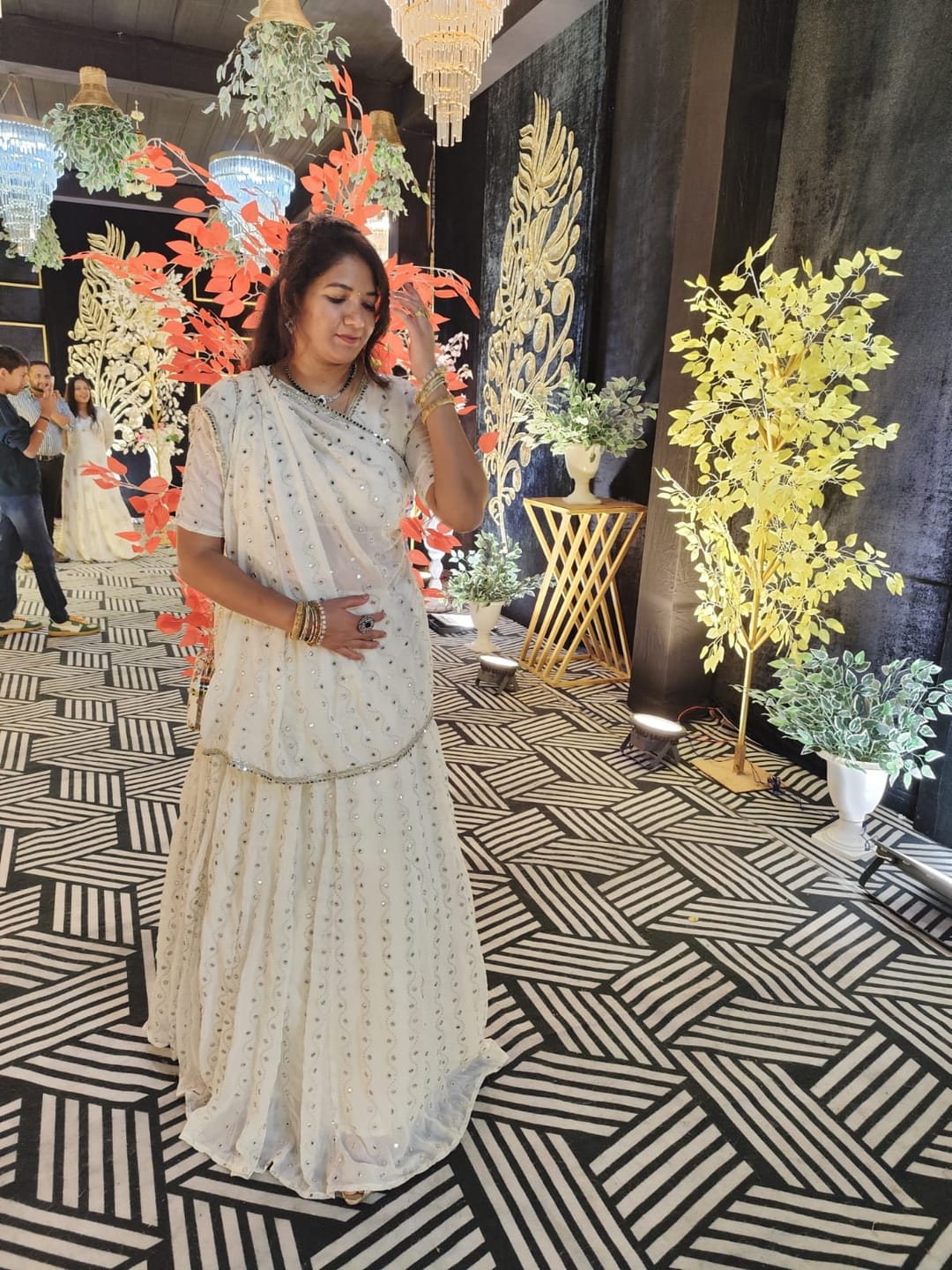 Customer photo review of Astoria Ivory Mirror Work Lehenga Set