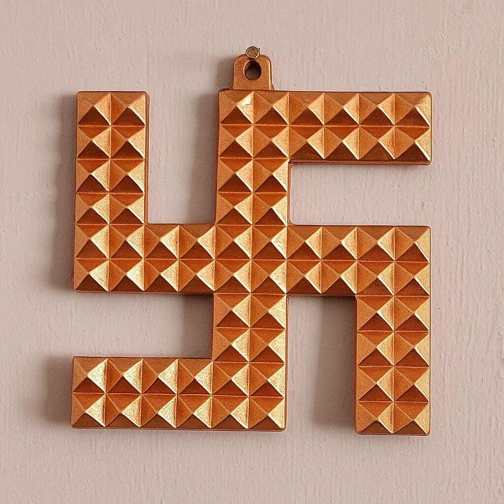 Customer photo review of Authentic Copper Swastik Pyramid Vastu Remedy for Positive Energy, Dosh Nivaran & Main Door Entrance – Multi-Size Home & Office Use | Vastu Mandir
