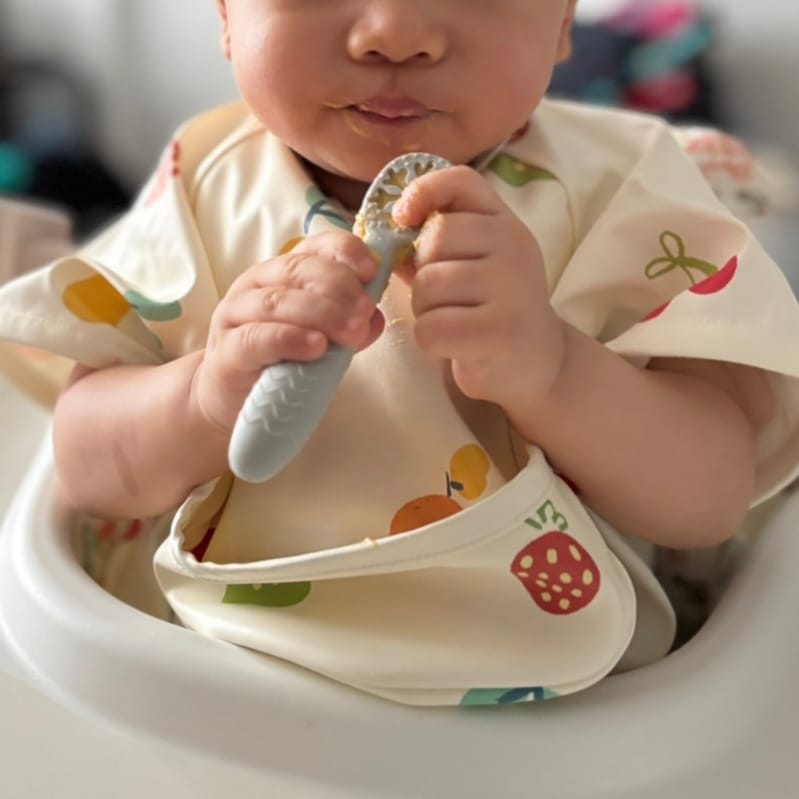 Customer photo review of Bee Clean Polyester Bib (Fruity)