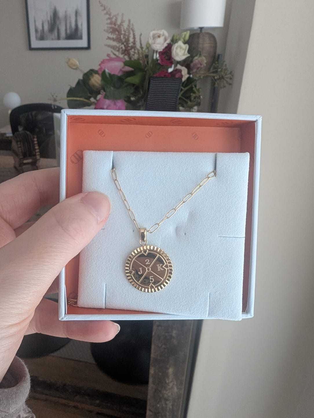 Customer photo review of Engravable Compass Necklace