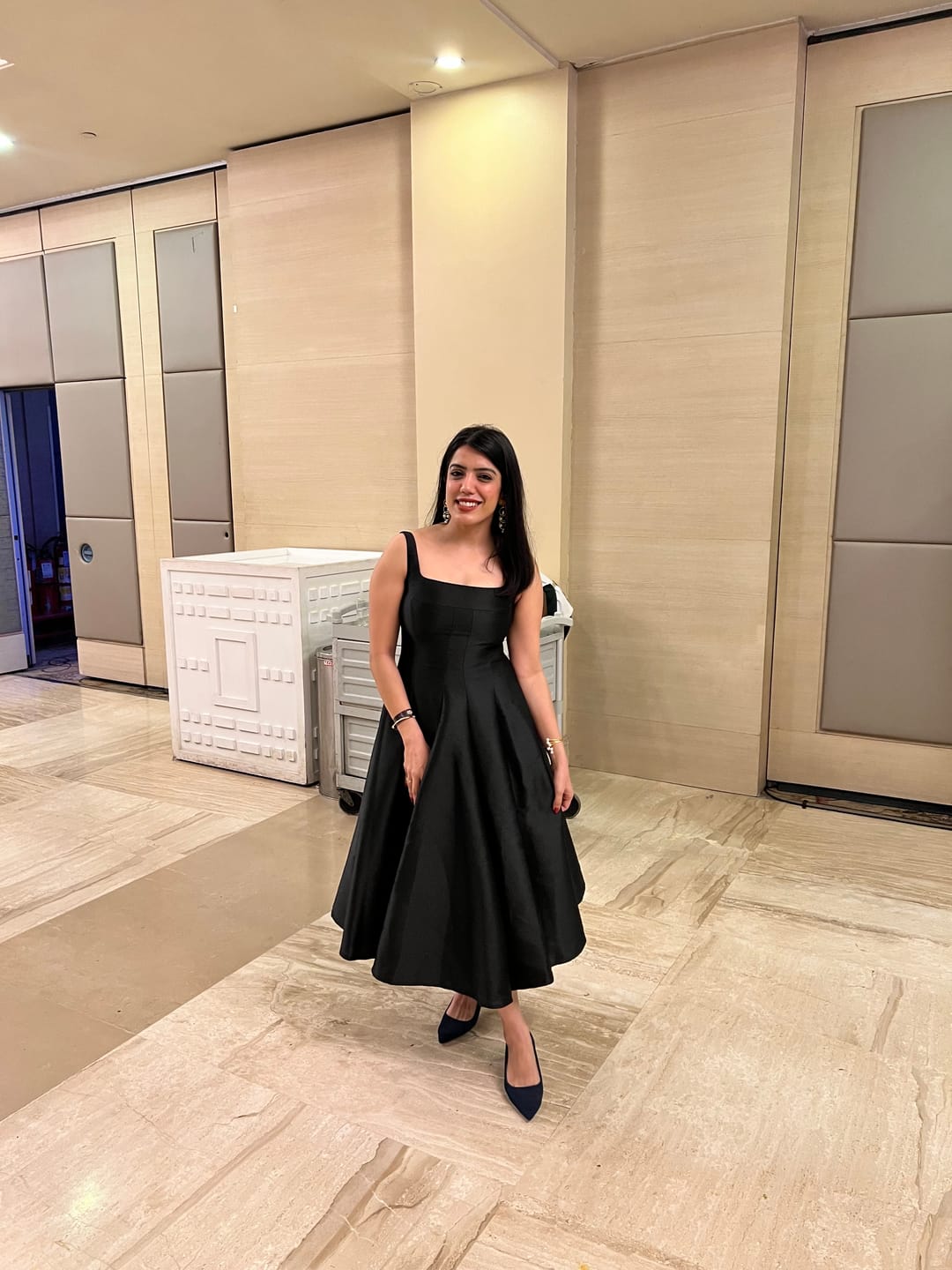 Customer photo review of Rigata Holiday Statement Maxi Dress in Black
