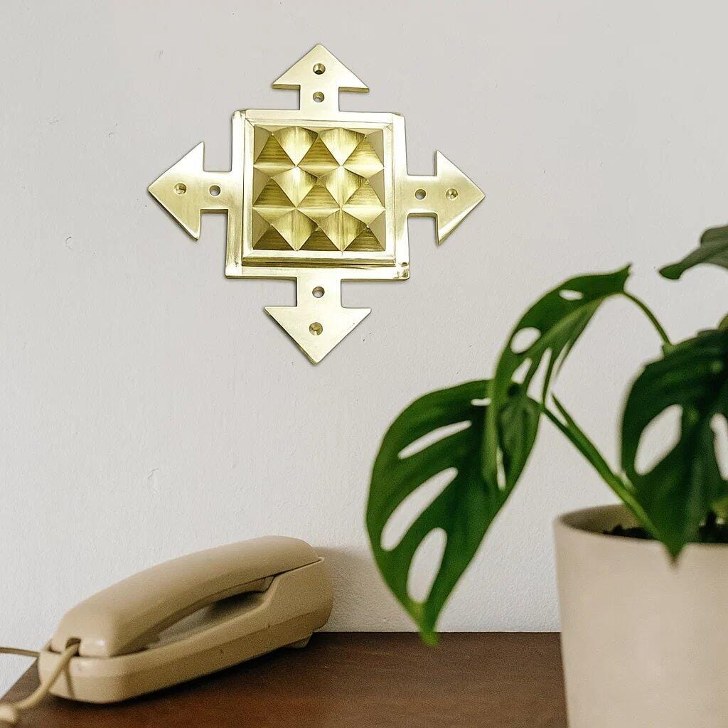 Customer photo review of Premium 100% Pure Brass Arrow Pyramid Plate Spiritual Helix Heal Vastu Dosh for South Direction for Vastu Positive Energy of Main Door Entrance, Kitchen, Bedroom, Office by Vastu Mandir