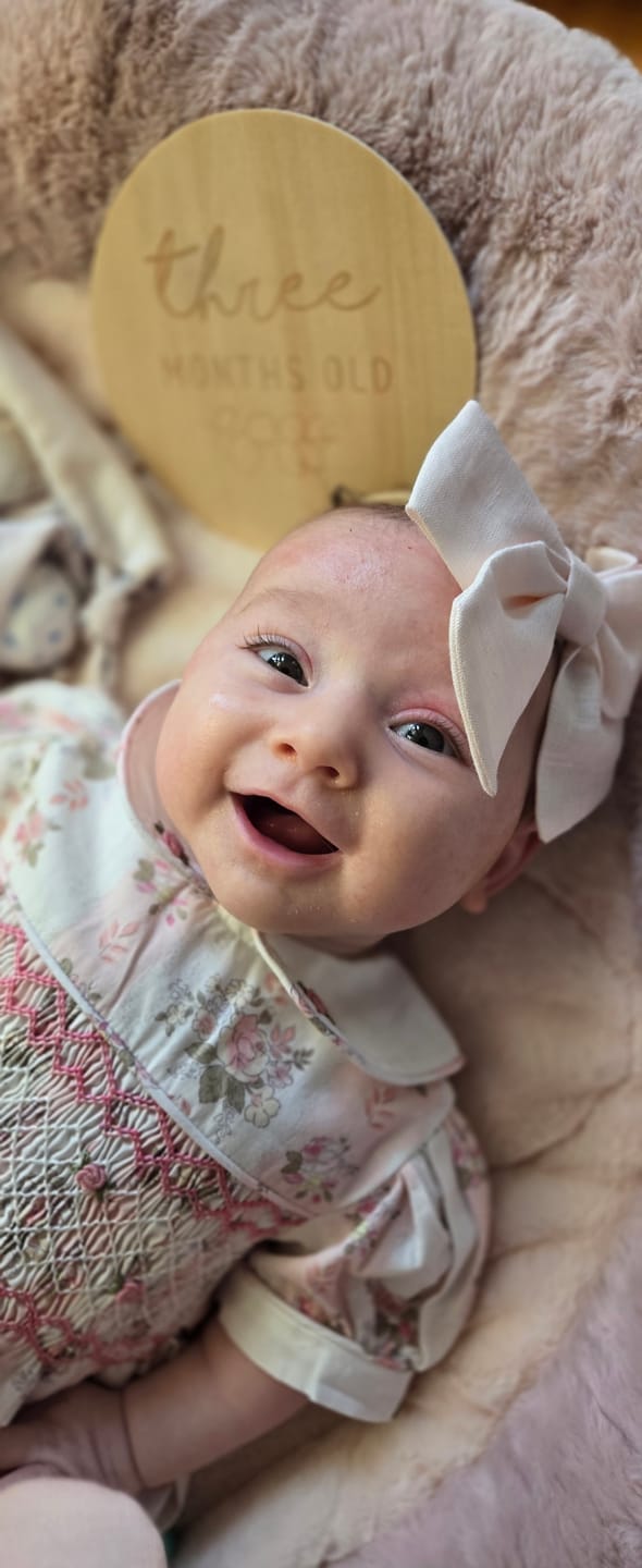 Customer photo review of Adeline Handsmocked Romper