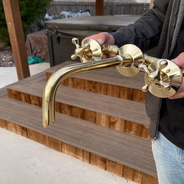 Customer photo review of Unlacquered Brass Handcrafted Wall Mounted Faucet, Snake Style