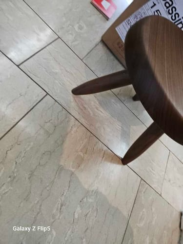 Customer photo showing scale next to seating