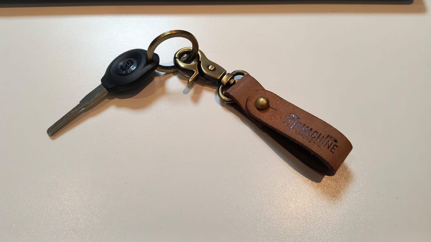 Customer photo review of key fob with antique gold