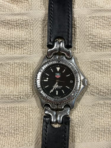 Customer photo from a verified review of a custom notched leather watch strap