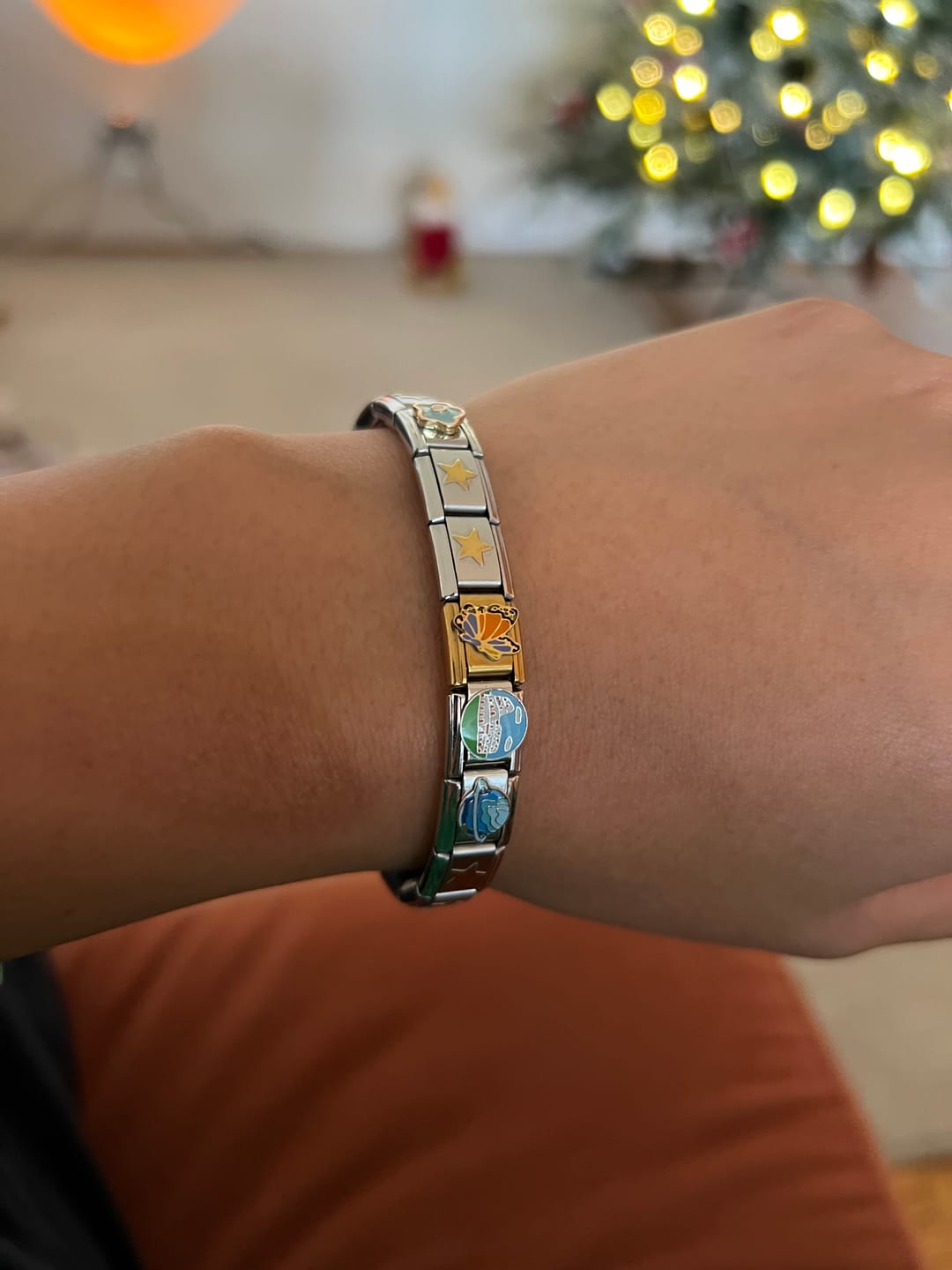 Customer photo review of Charm Mariposa Naranja Con Morado
