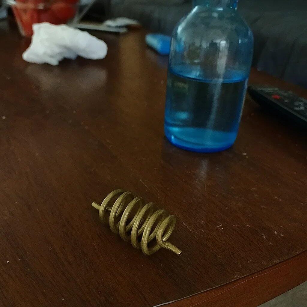 Customer photo review of Premium Brass Vastu Spring Remedy Clockwise Anticlockwise for Earth Element Balancing, Polarity Change & SSW SW Zone Correction Vastu Remedies in Floor Embedding, Staircase Areas & Entrance Blocking by Vastu Mandir