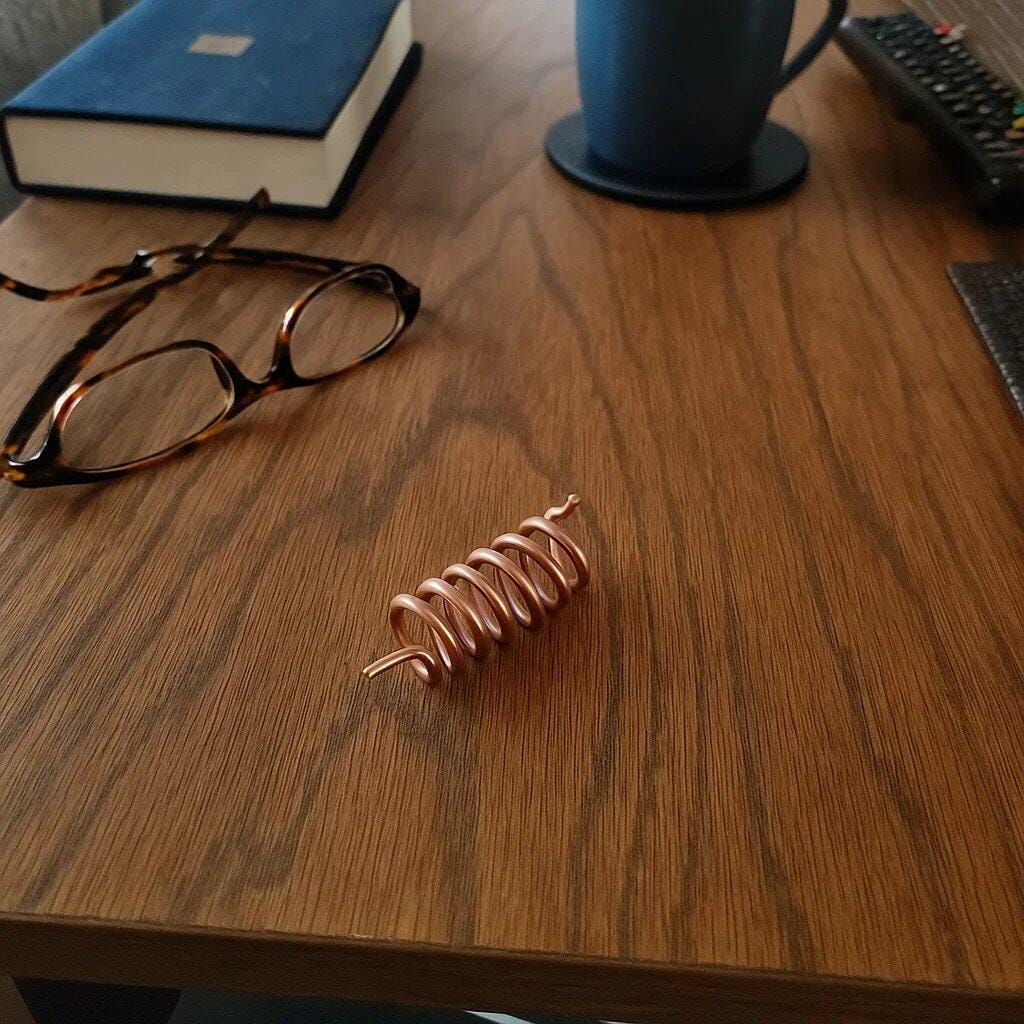 Customer photo review of Premium Copper Vastu Spring Remedy Clockwise Anticlockwise for Fire Element Balancing, South Direction Vastu Remedies & Polarity Change in Floor Embedding, Kitchen Areas & Wealth Corners by Vastu Mandir