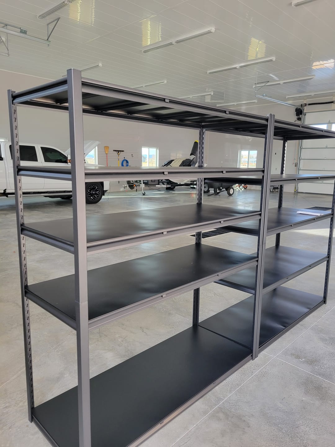 Customer photo review of REIBII 60"W x 72"H Industrial Garage Shelving, 3000LBS Heavy Duty Storage Shelves, Adjustable Metal Shelving for Basement Warehouse