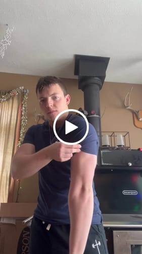 Customer video review of Original Fitted Performance Tee