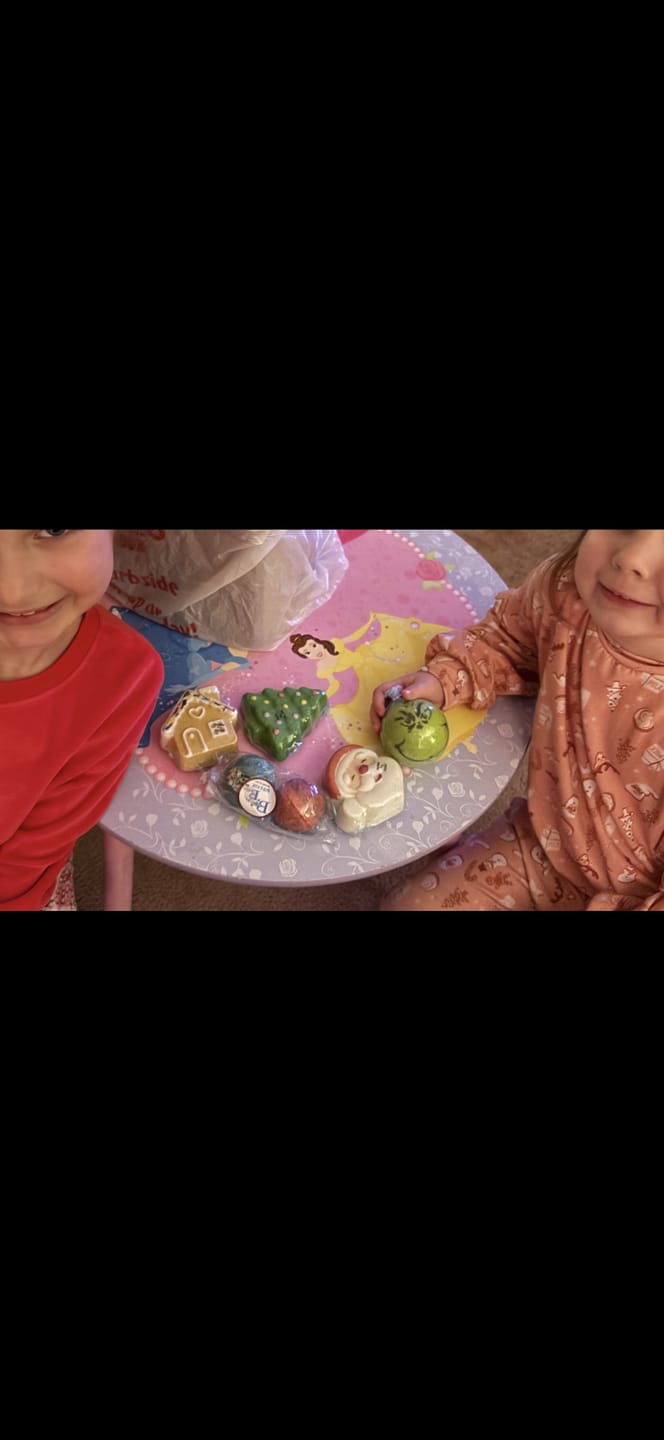 Customer photo review of Grinch Kids Bath Bomb with Toy Grinch Mini Figure Inside