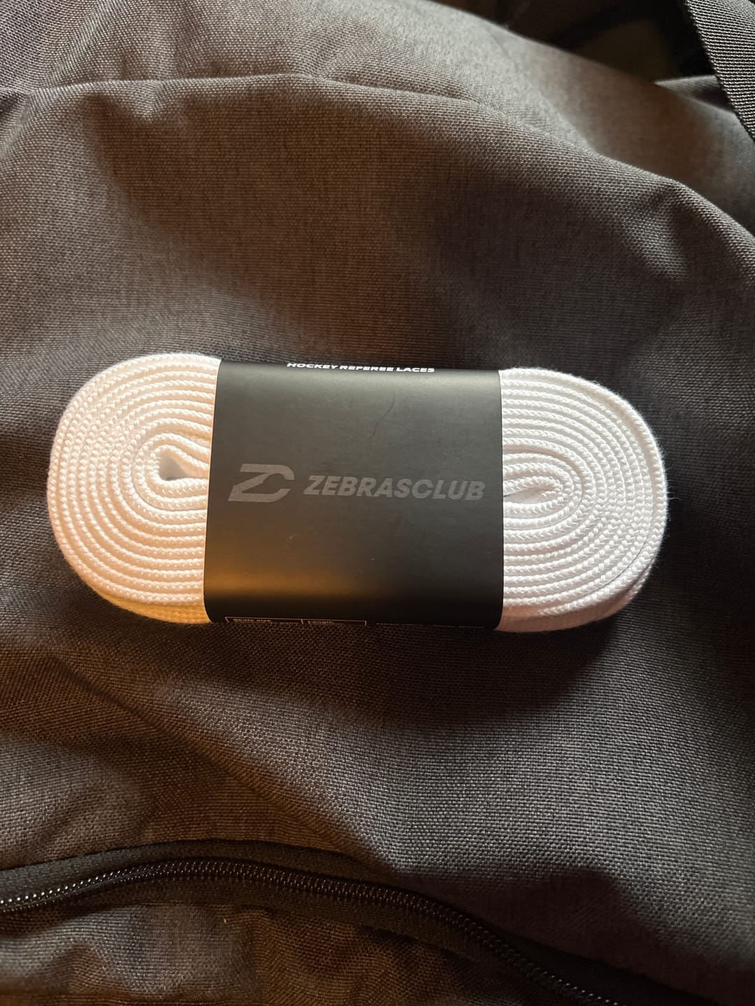 Customer photo review of WHITE NON-WAXED HOCKEY REFEREE LACES