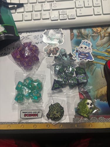 Customer photo review of Fright Night Mystery Dice – Spooky dice, pins and stickers!