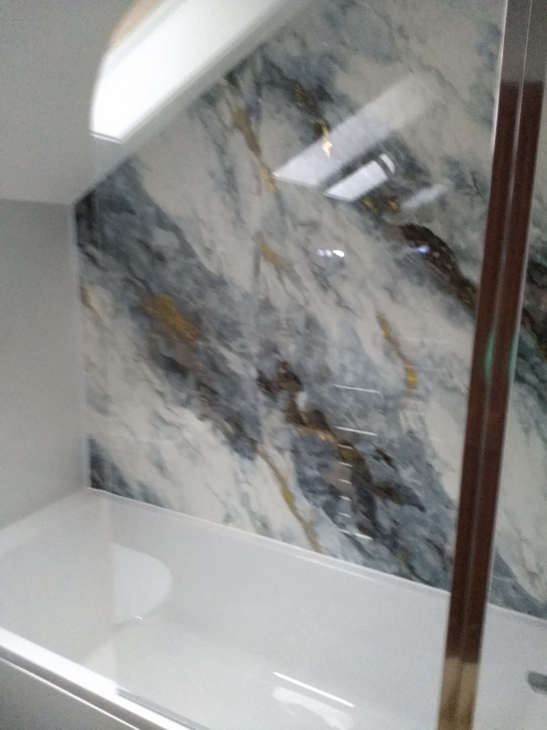 Customer photo review of 10mm Ocean Blue Gloss Shower Panel 1M x 2.4M