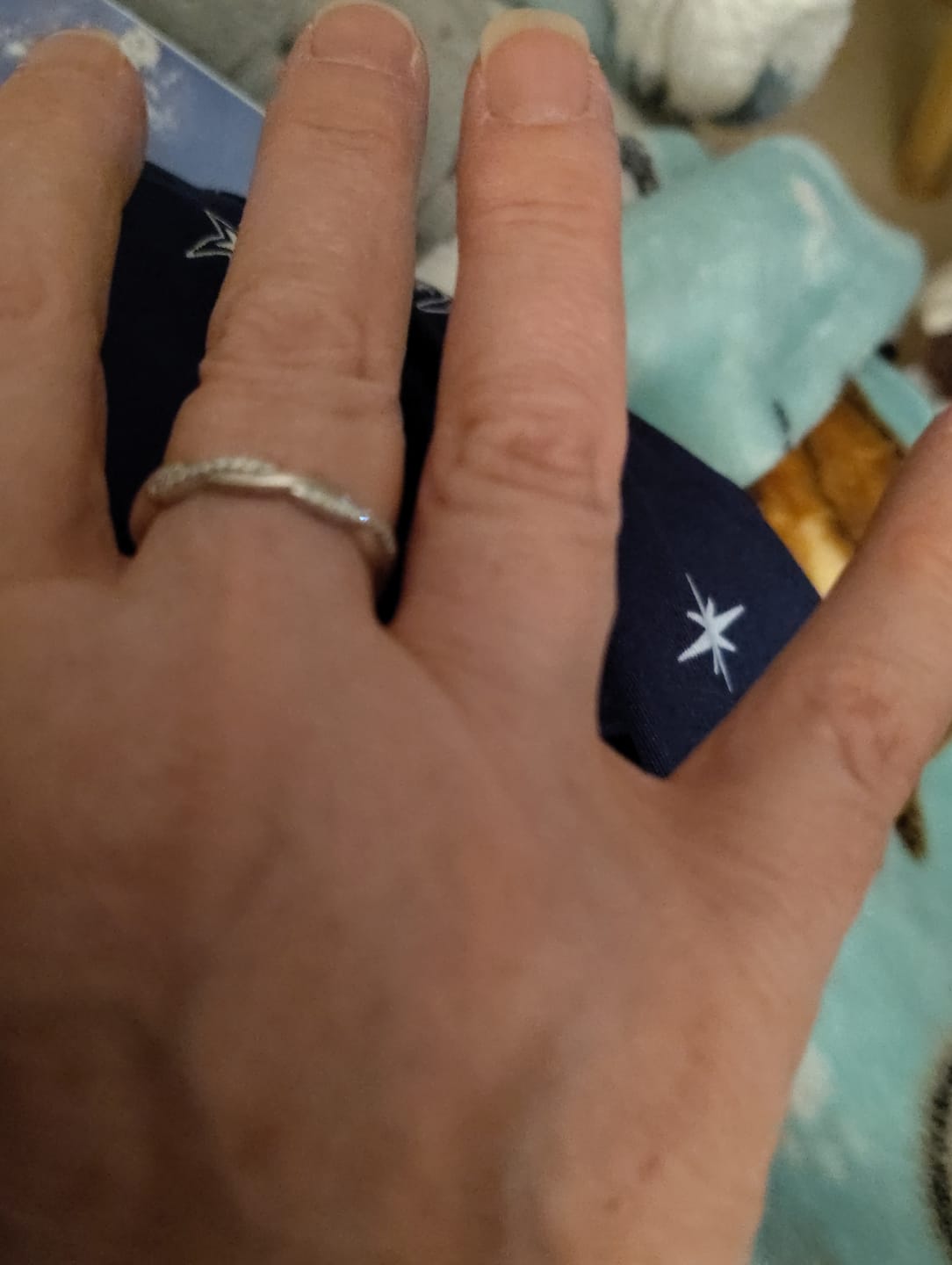 Customer photo review of Twisted Vine Moissanite Half Eternity Wedding Band Stackable Ring