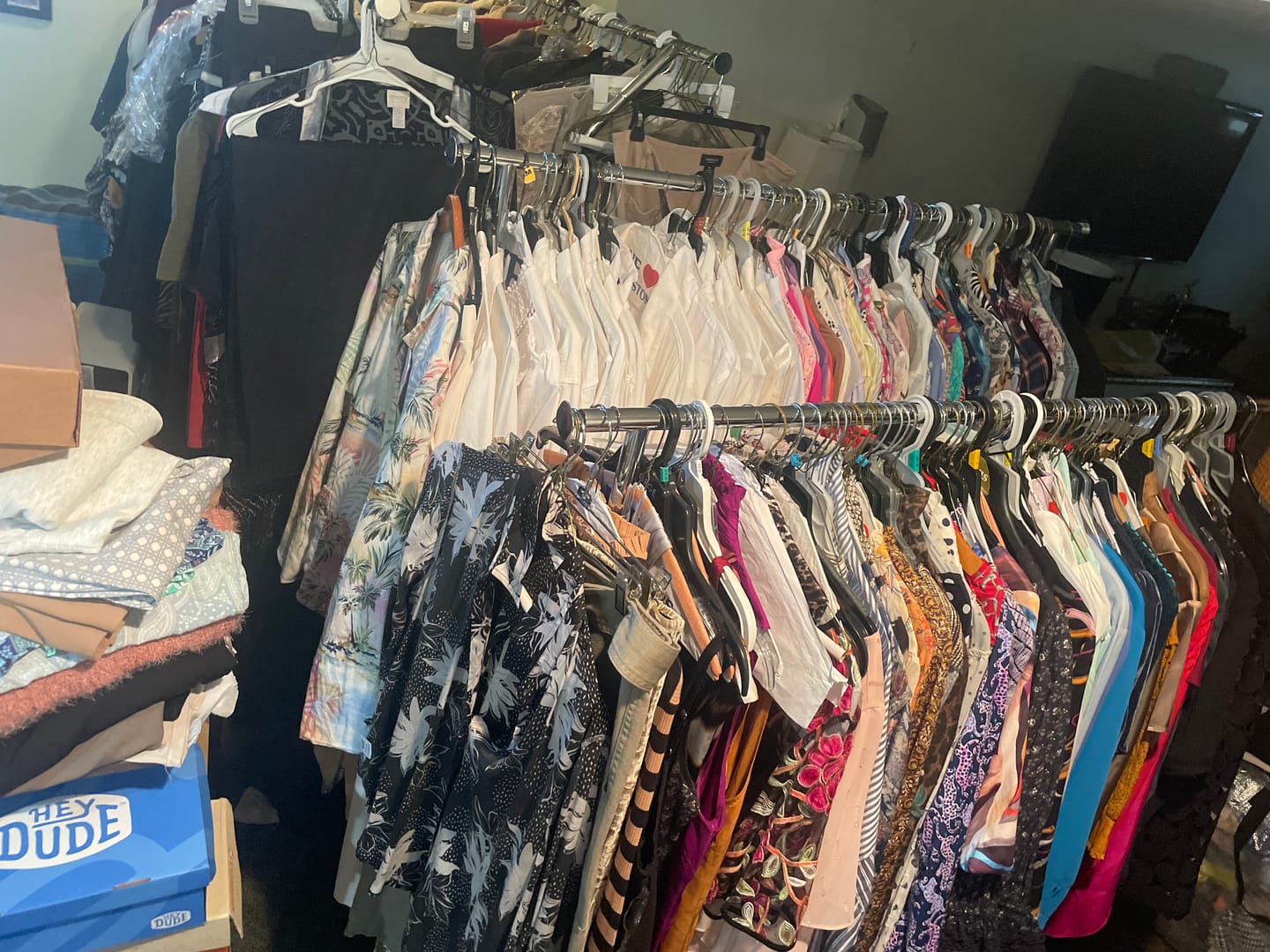 Customer photo review of Raybee 74"W Heavy Duty Clothes Rack on Wheels, 630LBS Adjustable Double Rod Garment Rack, Chrome Metal Commercial Clothing Rack with Storage Shelves
