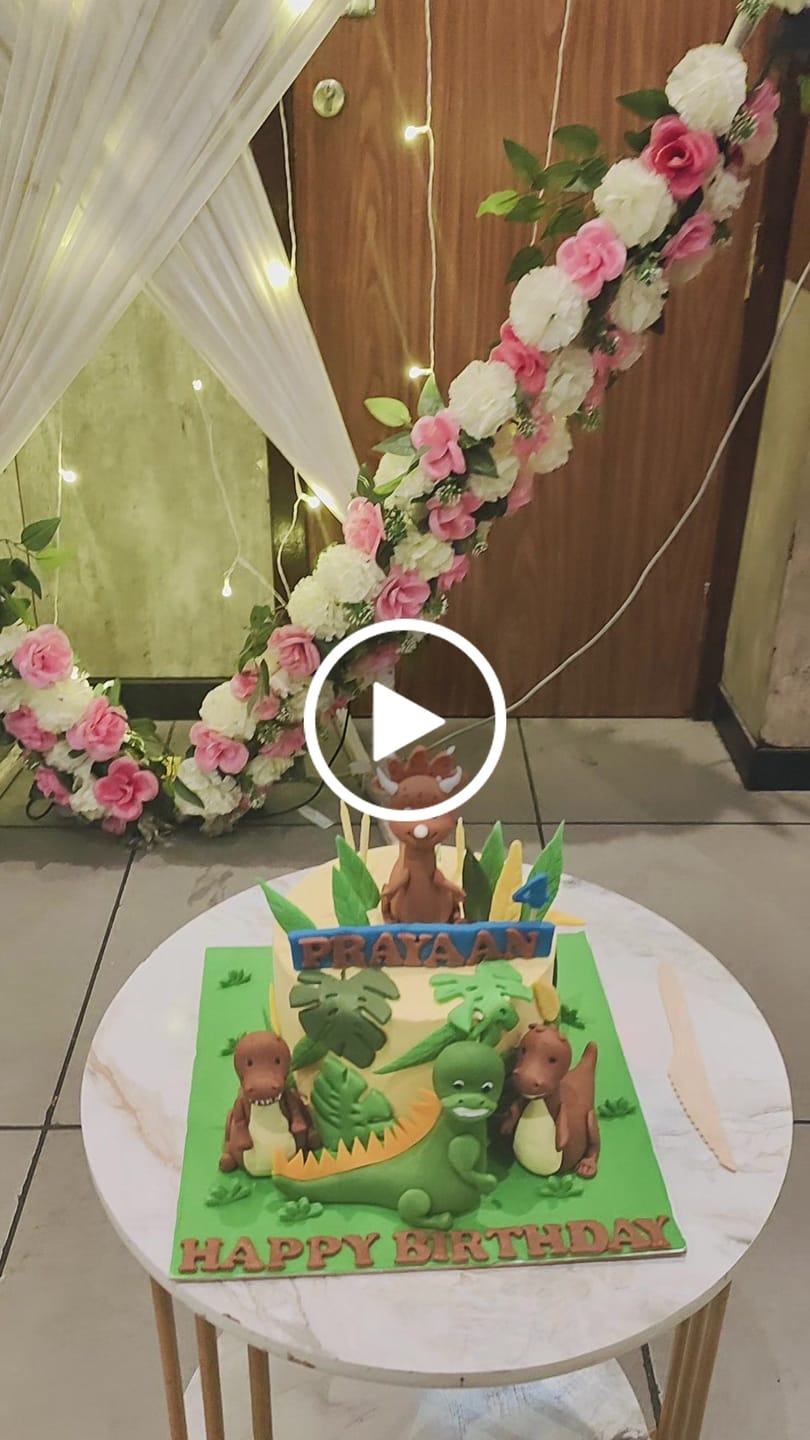Customer video review of Baby Dino Themed Cake