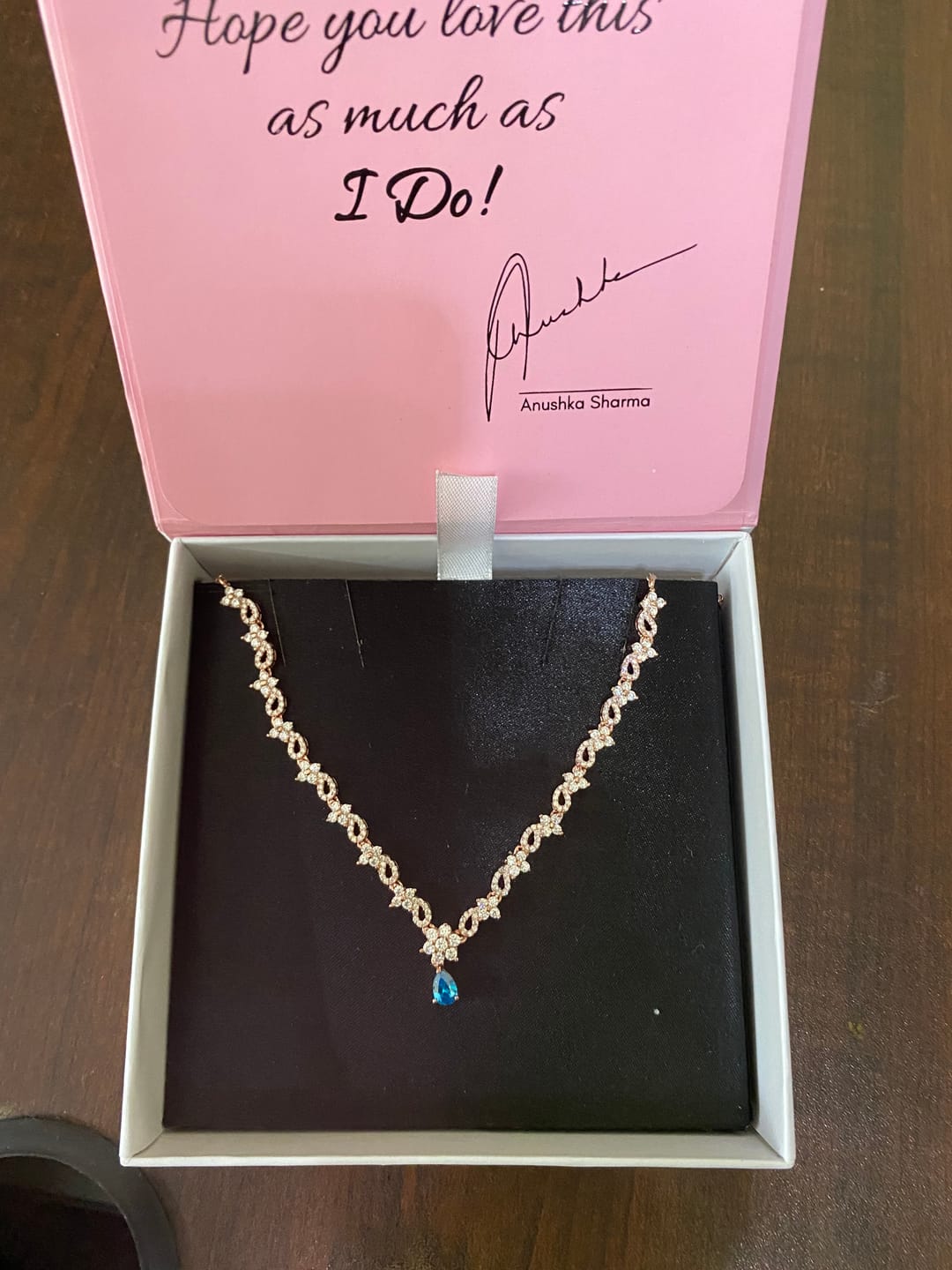 Customer photo review of Rose Gold Blue Moon Necklace