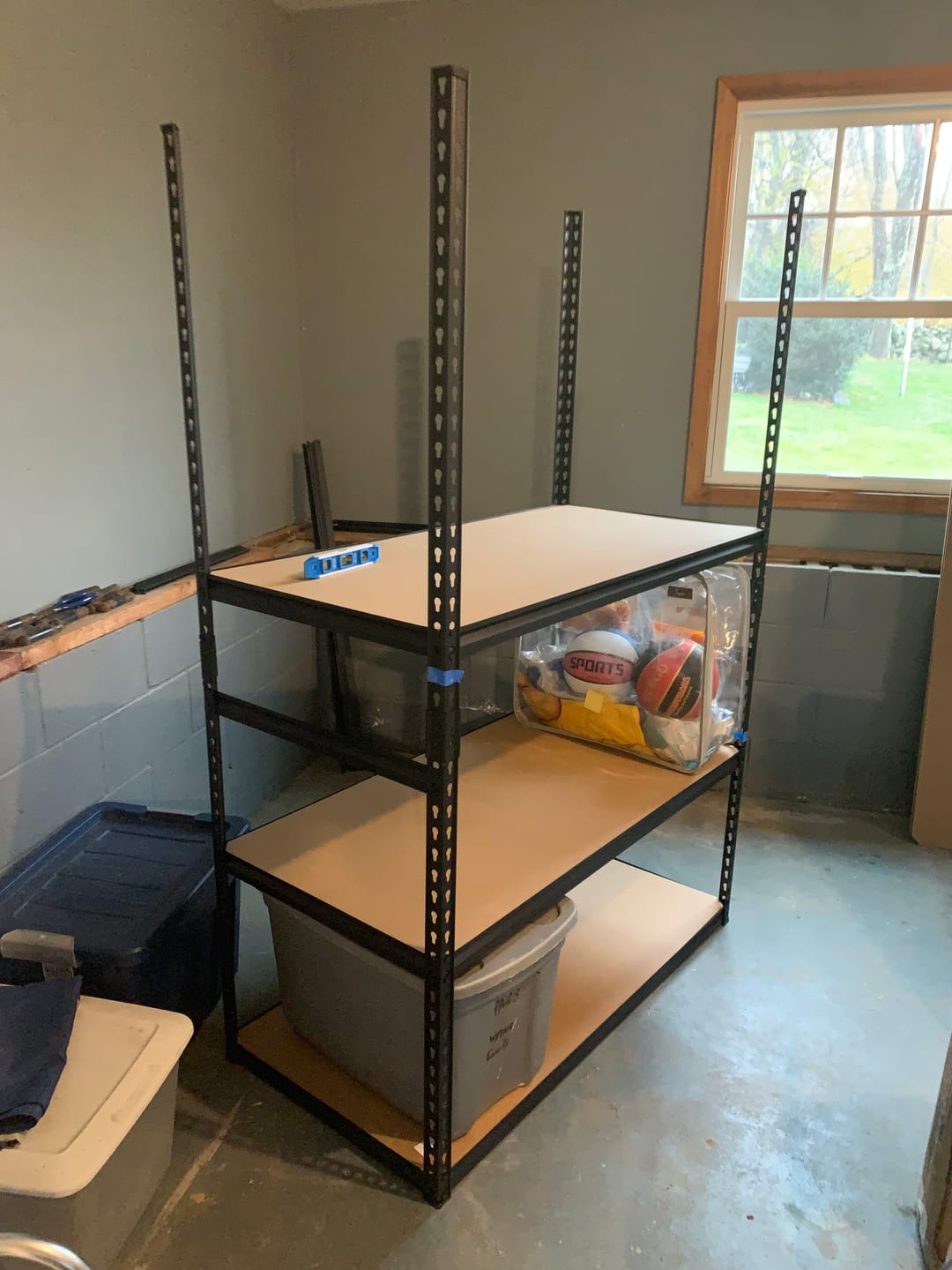 Customer photo review of Reibii 48.2" W x 24" D Heavy Duty Garage Shelving Units Load 3000LBS, Adjustable Steel Shelves for Garage Basement Warehouse