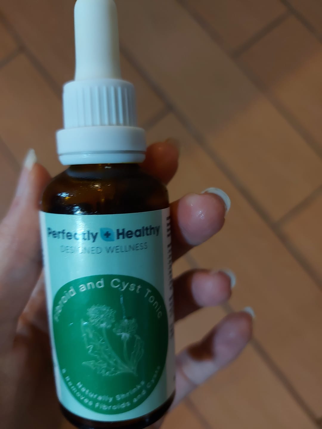 Customer photo review of Female Fibroid & Cyst Tonic