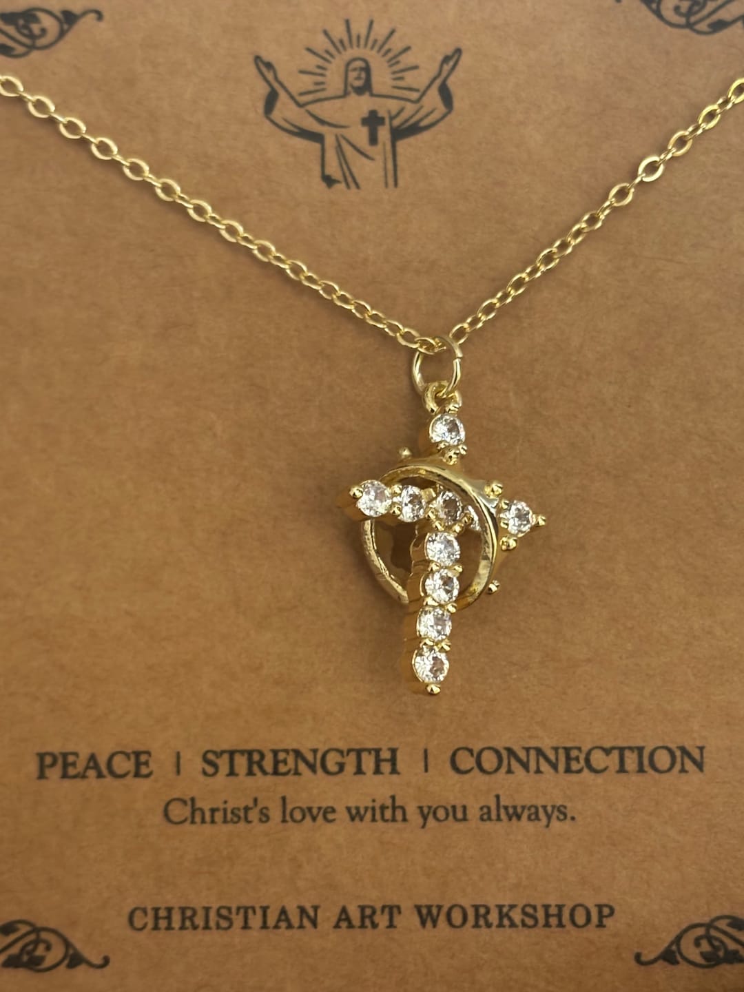 Customer photo review of FREE Today: Modern Crowned in Faith Cross Necklace, Earrings