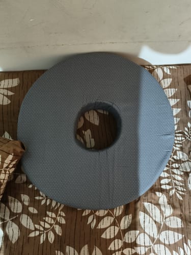 Customer photo review of Orthopaedic Coccyx Cushion Seat | For Lower Back & Tailbone Pain Reliever | Useful on a Car Seat / Office Chair (Grey)