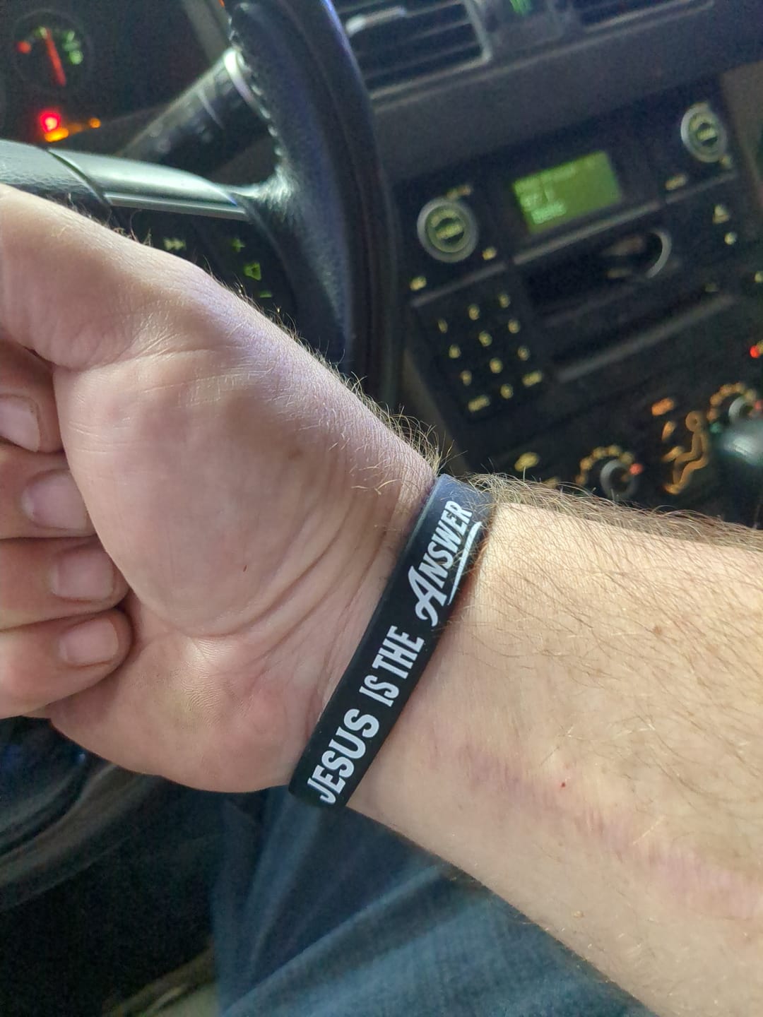 Customer photo review of Jesus Is The Answer Wristband