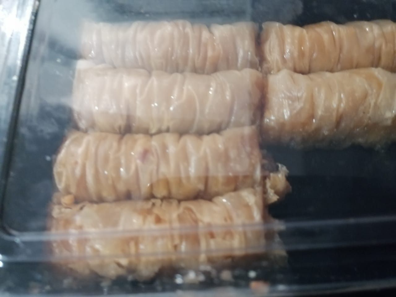 Customer photo review of Traditional Greek Saragli – Rolled Baklava with Almonds (8 pieces – 250g)