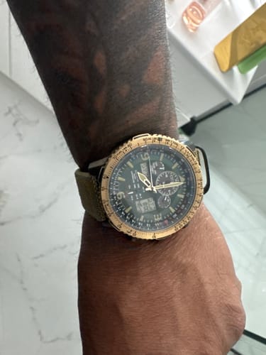 Customer photo review of Citizen Eco-Drive Men's 45mm Black & Rose Analogue Digital Watch JY8074-11X