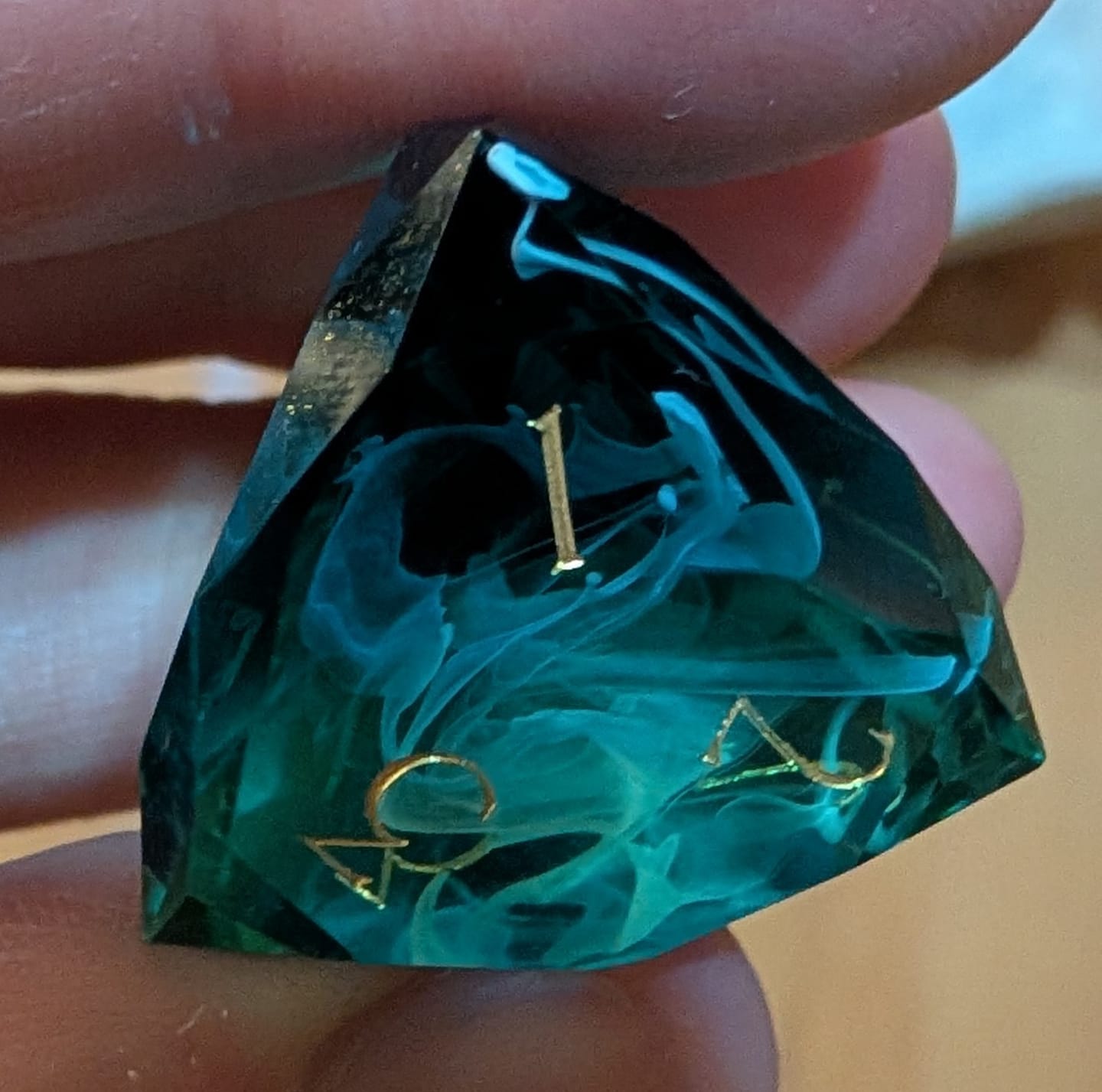 Customer photo review of URWizards D&D Resin Tidebound Fate Engraved Dice Set Multi-faceted Style